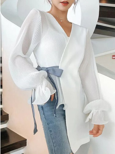 Elegante maglia maxi casacca