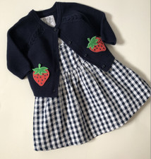 Vestito a quadri e cardigan