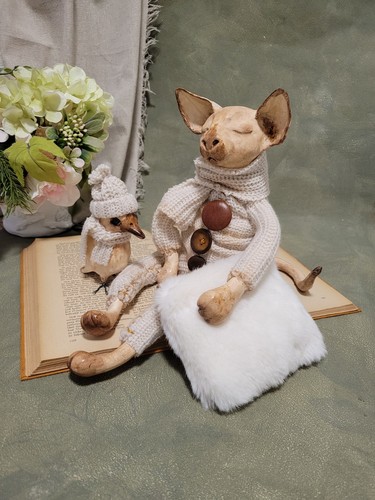 Sphynx gatto con uccellino