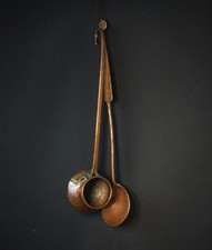 Coppia di antichi mestoli in