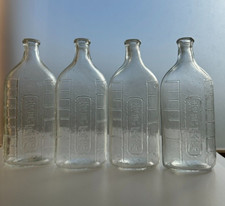 Set di 4 antiche bottiglie