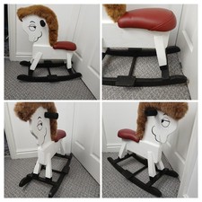 Cavallo a dondolo in legno