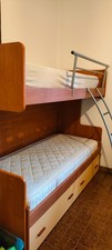 letto a castello legno, usato, ottime condizioni,doghe in legno,due cassettoni 