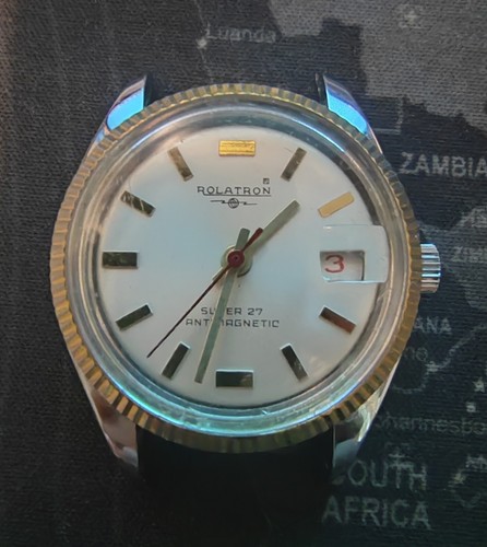 Orologio svizzero carica - orologio,