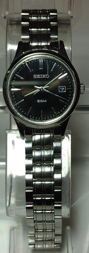 Seiko quartz 7n82 black dial - black,