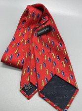Cravatta uomo Tiffany & Co seta rossa cavalletta stampa grillo Made in Italy usata in ottime condizioni