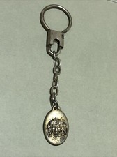 PUBBLICITÀ:CIONDOLO CON LA TESTA CARATTERISTICA DEL BRANDY VECCHIA ROMAGNA-EPOCA