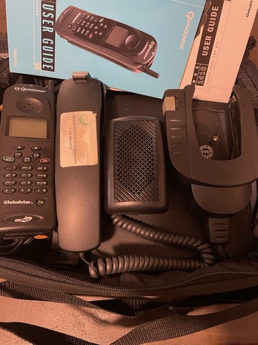 Satellite phone with charger - with,