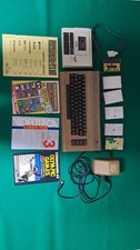 Commodore 64 con alimentatore, registratore e cassette e fascicoli