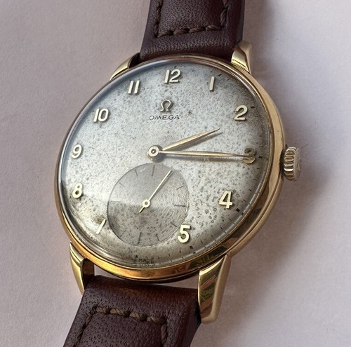 Omega oro - in,