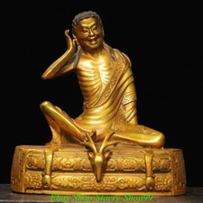 Statua testa di cervo seduta