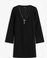 Mini abito 9875 con fiocco glitterato. taglia 36