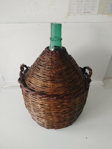 Antica damigiana impagliata a - ,