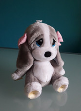 "SAD SAM & HONEY" Peluche cane, 2001, colore grigio e bianco, altezza 20 cm.