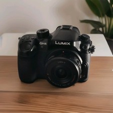 Panasonic GH4 con obiettivo G X Vario PZ 14-42mm, 16MP 4K, basso numero di otturatori, A+++