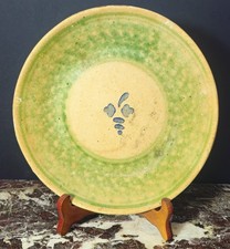 Antico piatto in terracotta-