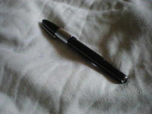 Pluma estilografica con - con, un