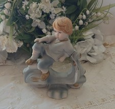 Vespa con bimbo in porcellana