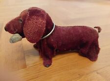 Antico giocattolo vintage: cane bassotto, rivestito in tessuto, metallo interno.