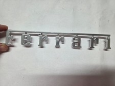 FERRARI EMBLEM INITIALS SCRIPT MOTIF (2 PIN) 61025000 60307006 60716800