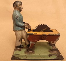 Bambola - Bing "Tin Toy Drive Models: Man at Circular Saw", vecchia anni '30, Germania