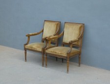 Coppia di poltrone intagliate