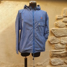 Giacca a vento giubbotto impermeabile cappuccio celeste stampa scritta taglia L 