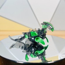 Modellino Bakugan Dharak traslucido nero e verde Darkus Gundalian Invaders