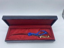 Tagliacarte Arma dei Carabinieri forma di sciabola . Lunghezza 23 cm.