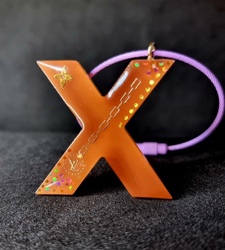 Designer logo keyring letter - logo,