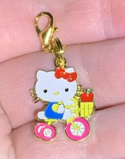Gold hello kitty riding - gold,