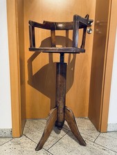 Vecchia sedia da parrucchiere