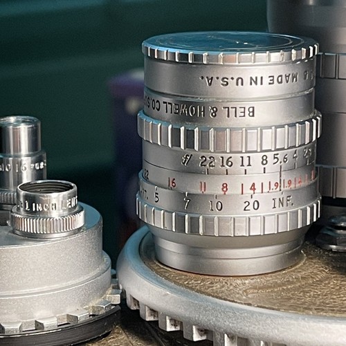 Bell howell super comat - &,