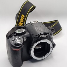 REFLEX NIKON D3100 + OBIETTIVO AF-S NIKKOR 55-200mm + CARICATORE