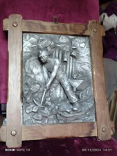 pannello altorilievo minatore