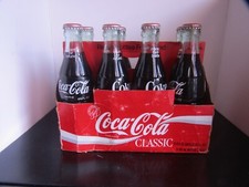 8 pack Classic Coke bottles in
