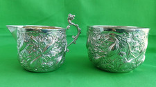 Sterling Silver repousse cream