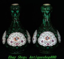 Coppia vasi bottiglia fiori