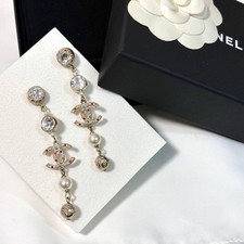 Orecchini lunghi CHANEL con