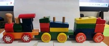 Trenino in legno per bambini con Mattoncini Colorati.