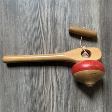 Trottola in legno. Con