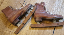 Pattini vintage pelle antichi