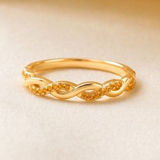 Anello a fascia attorcigliata