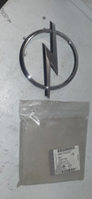 GM 13142521 GR.8.147 0 STEMMA  CROMATO LUCIDO NUOVO ORIGINALE PER OPEL