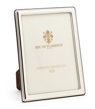 Cornice in argento massiccio