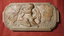 scultura in terracotta. Putto