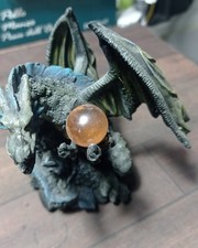 Drago con sfera magica in metallo altezza  112 mm
