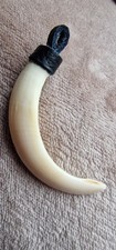 CIONDOLO dente di