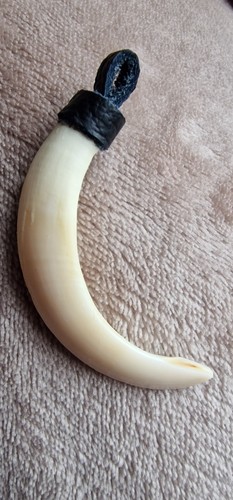 Ciondolo dente - dente, di