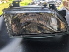 Fanale proiettore anteriore sinistro Ford Escort Mk4 1992-1995 (36303 J-7-F-2)
